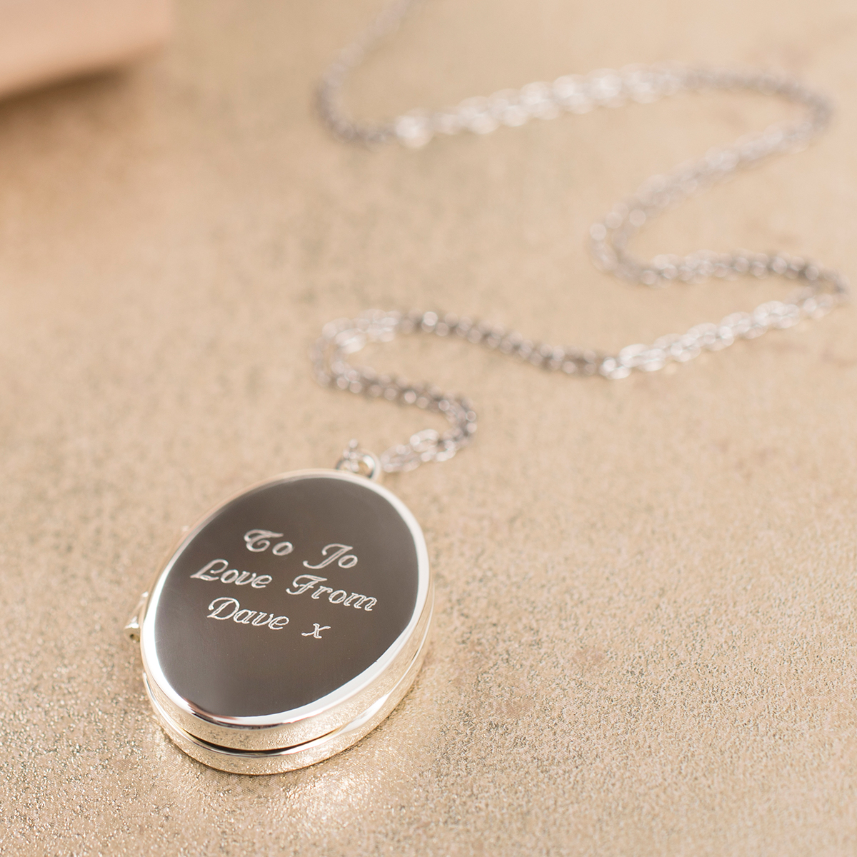 Engraved Oval Shaped Locket Necklace
